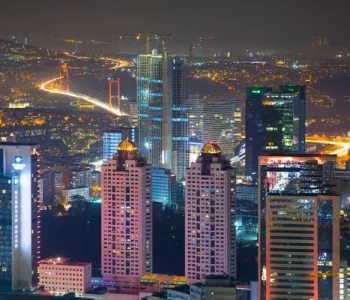 depositphotos_565475970-stock-photo-aerial-night-panoramic-view-business